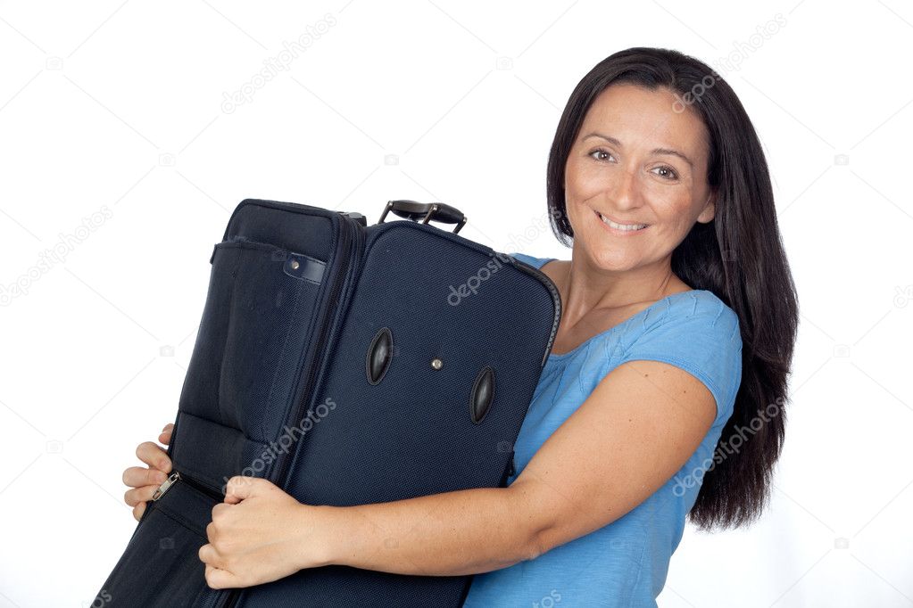 Excited woman with a heavy suitcase