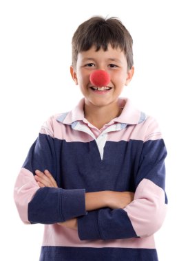 Portrait of an adorable child with a clown nose clipart