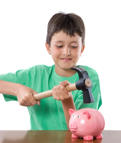 Niño con caja de dinero y martillo —  Fotos de Stock