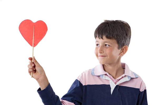 Αστείο παιδί με το γλειφιτζούρι με σχήμα καρδιάς — Φωτογραφία Αρχείου