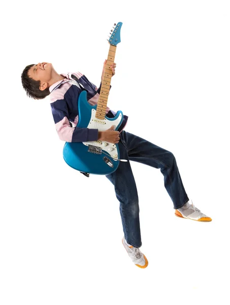 Child jumping with a guitar — Stock Photo, Image