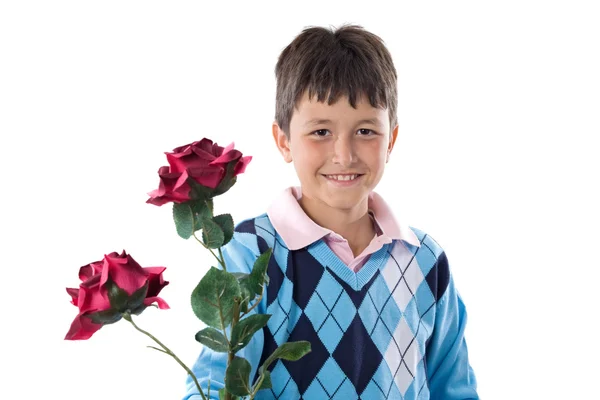 Pojke erbjuder blommor — Stockfoto