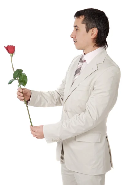 Attractive young man giving a love gift — Stock Photo, Image