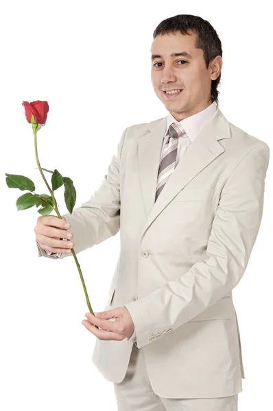 Attractive young man giving a love gift — Stock Photo, Image