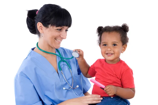 Pediatra com uma linda menina — Fotografia de Stock