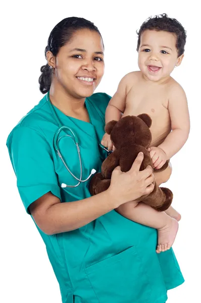 A csecsemőt a karjaiban imádnivaló orvos — Stock Fotó