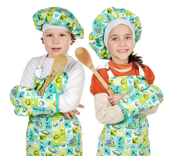 Niño y niña aprendiendo a cocinar — Foto de Stock