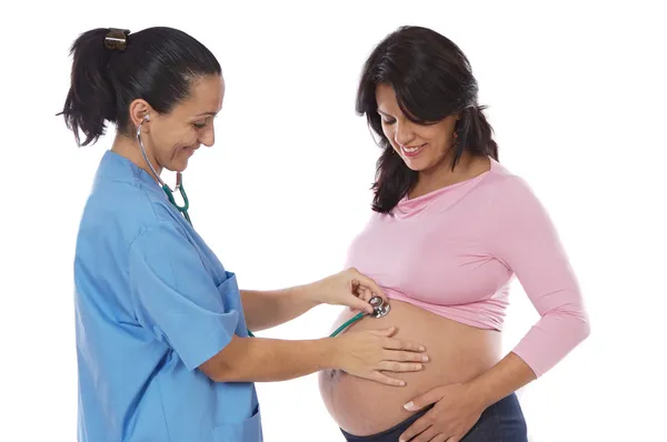 Ginecologista e menina bonita grávida — Fotografia de Stock