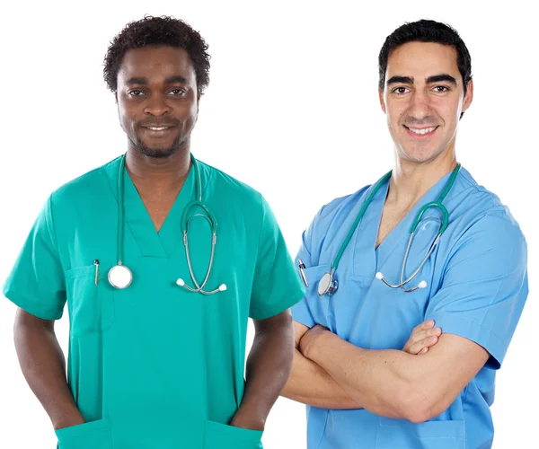 Médicos africanos e caucasianos — Fotografia de Stock