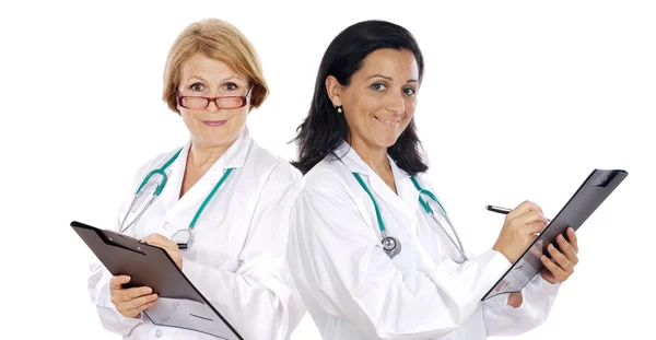Woman doctors writing — Stock Photo, Image