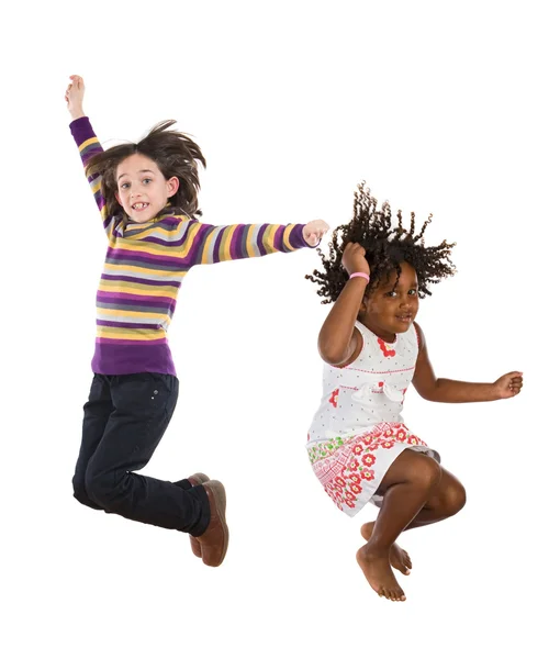 Niños saltando a la vez — Foto de Stock