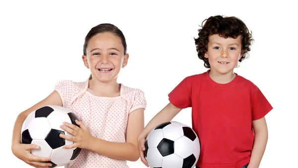 Due adorabili bambini con palloni da calcio — Foto Stock