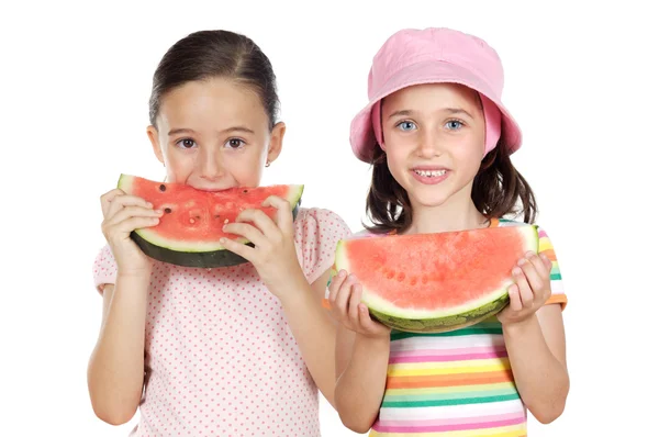 Duas meninas bonitas comendo melancia — Fotografia de Stock