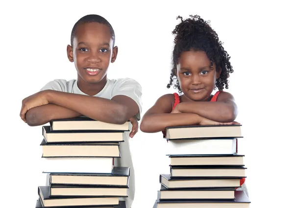 Brothers supported on a stack of books — Stock Photo, Image