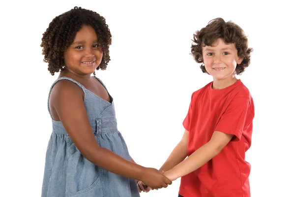 Duas crianças bonitas de raças diferentes — Fotografia de Stock