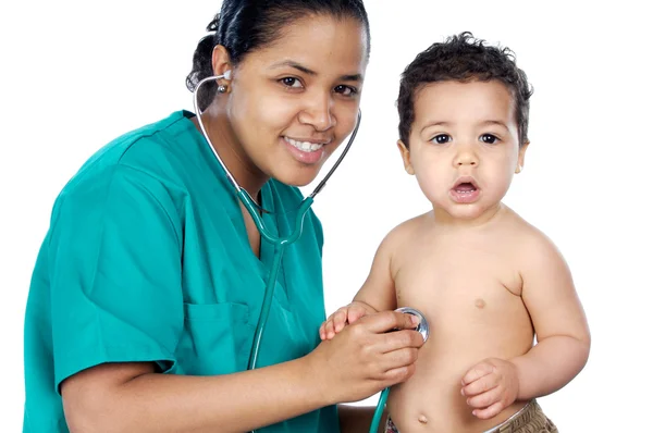 Unga barnläkare med baby — Stockfoto