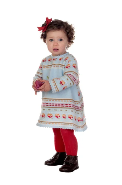 Funny baby flicka med röd slinga — Stockfoto