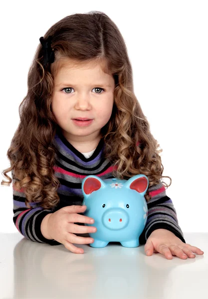 Adorable bebé con una caja de dinero azul — Foto de Stock
