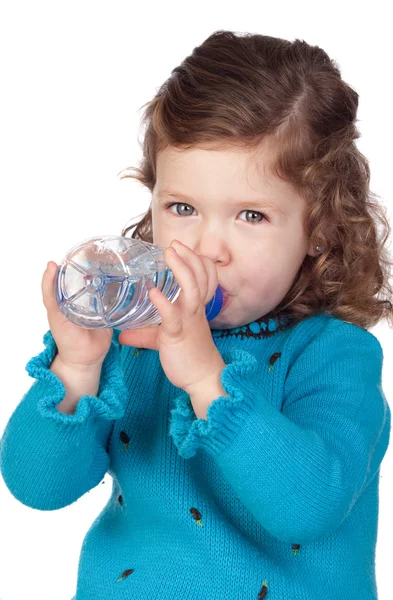 Beautiful baby girl with drinking with a water bottle — Stock Photo, Image