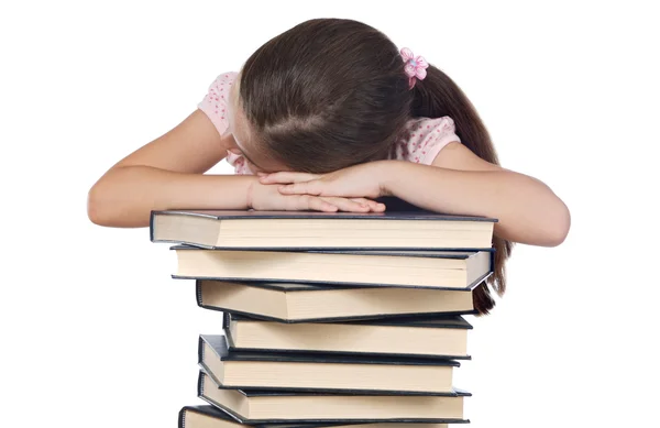 Κορίτσι κοιμάται στα βιβλία — Φωτογραφία Αρχείου