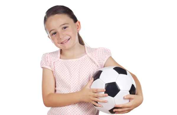 Flicka som håller en fotboll — Stockfoto