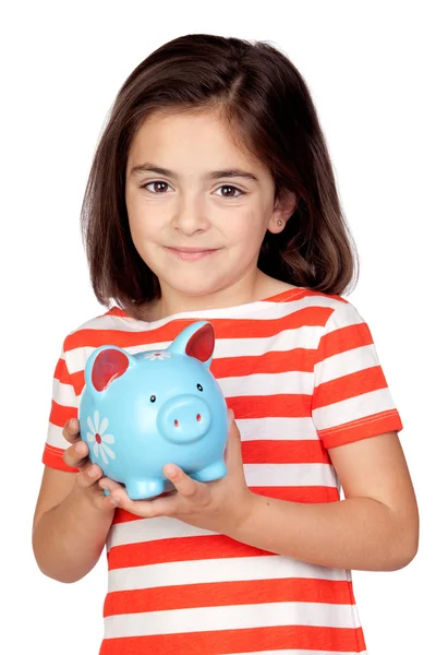 Brunette little girl with a blue moneybox — Stock Photo, Image