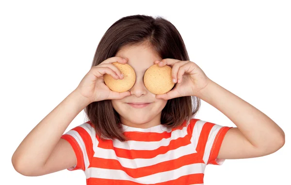 Brunette little girl with two biscuits — Stock Photo, Image