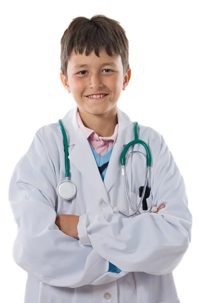 Adorabile ragazzo con vestiti di medico isolato su bianco Fotografia Stock