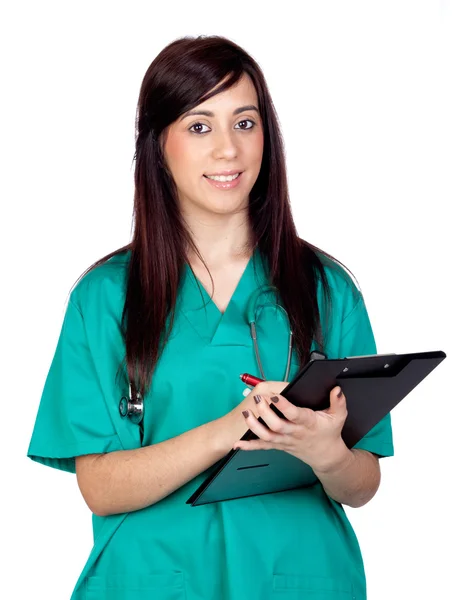 Attractive brunette doctor with clipboard Royalty Free Stock Photos