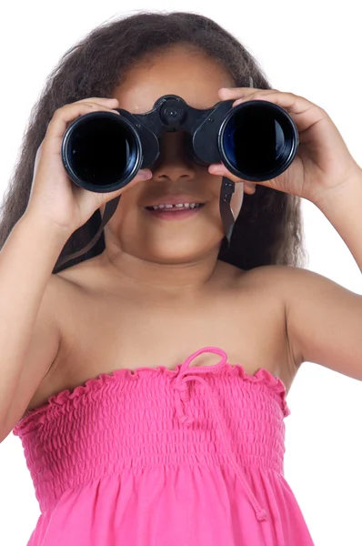Chica mirando a través de los prismáticos — Foto de Stock