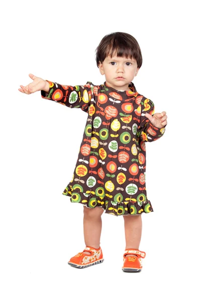 Çiçekli bir elbise ile güzel bebek kız — Stok fotoğraf