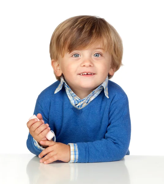 Piękne dziecko z blue jersey jedzenia słodki — Zdjęcie stockowe