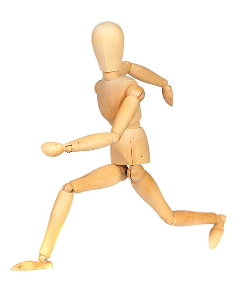 Jointed wooden mannequin running — Stock Photo, Image
