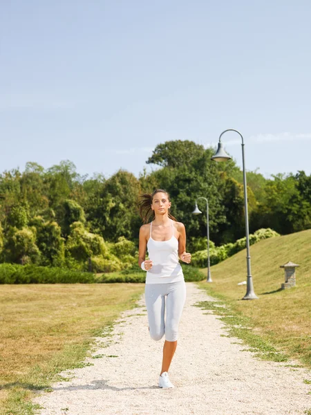 Young woman jogging — Stock Photo, Image