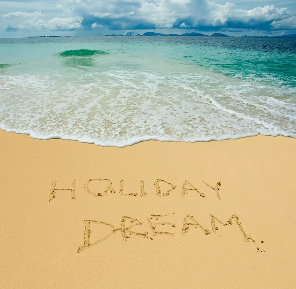 Holiday dream written in a sandy tropical beach — Stock Photo ...