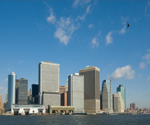 Panorama of manhattan with flying helicopter, new york, usa