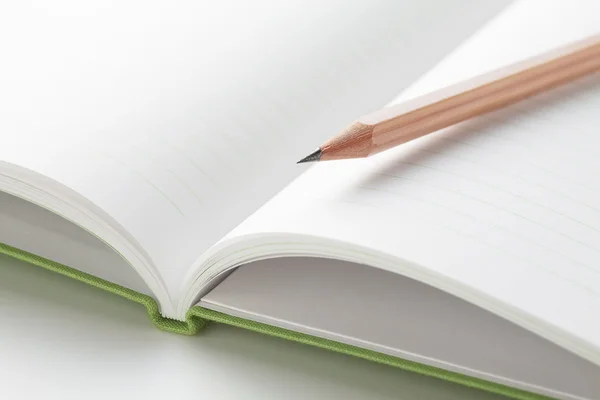 Ołówek w notatniku — Zdjęcie stockowe