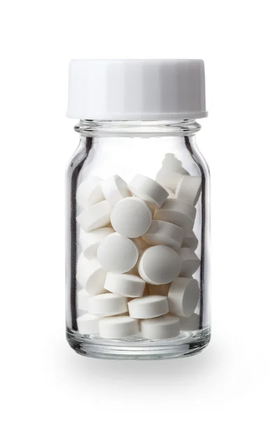 Pílulas em uma garrafa — Fotografia de Stock