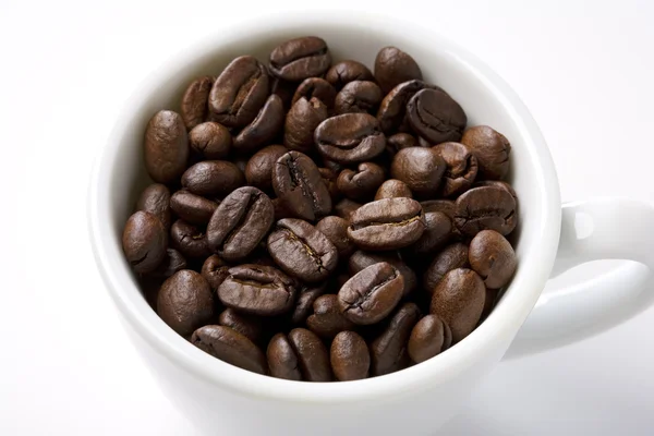 Ceașcă de boabe de cafea — Fotografie, imagine de stoc