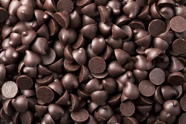 Chocolate chips background — Stock Photo, Image