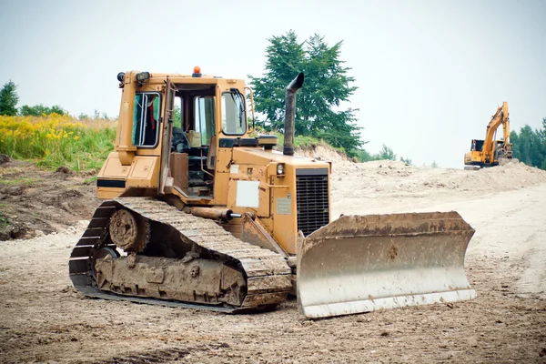 Bulldozer in the construction site Stock Image