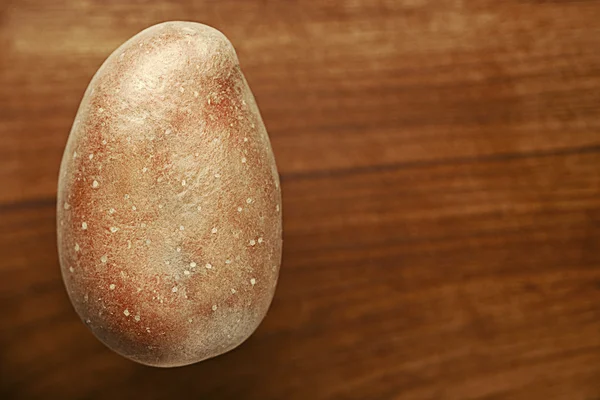 stock image Raw potato on cutting board