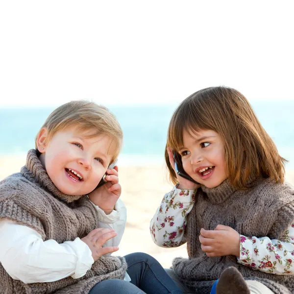 Infants having conversation by phone. — Stock Photo, Image