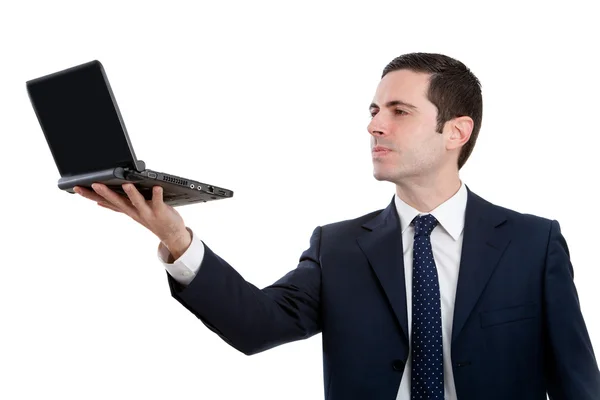 Portrait of executive holding laptop up high — Stock Photo, Image