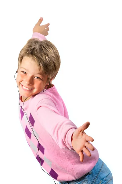Menino feliz com fones de ouvido isolados em branco — Fotografia de Stock