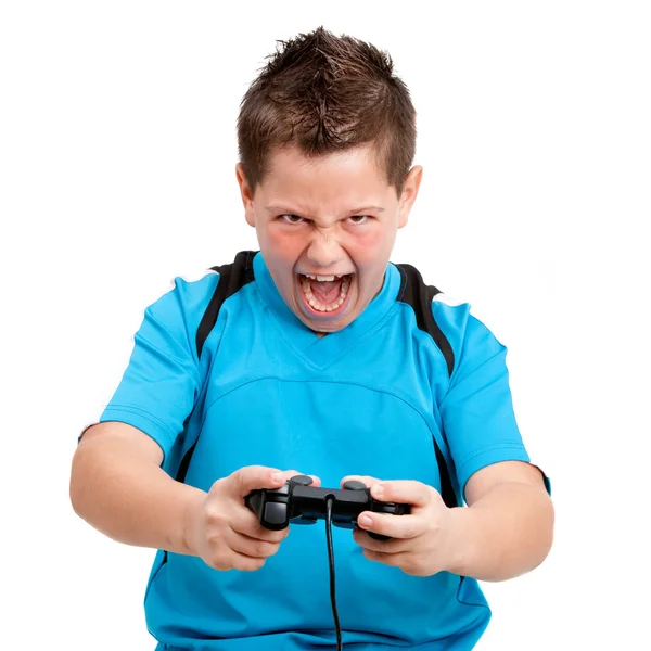 stock image Boy with winning attitude playing with console