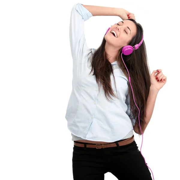 Junge Frau mit rosa Kopfhörern. — Stockfoto