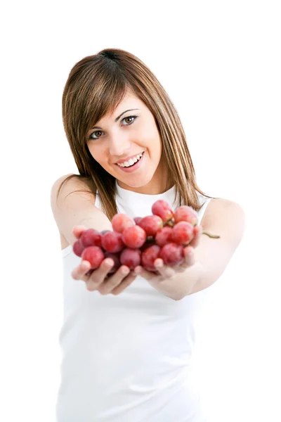 Sağlıklı genç bir kadın tutarak üzüm. — Stok fotoğraf