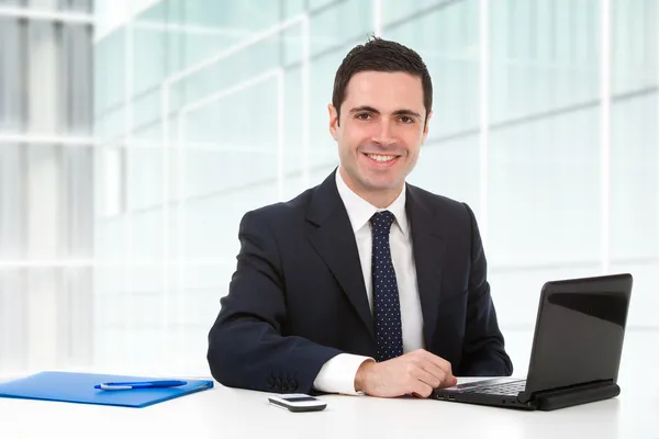 Portrait of office worker at desk Stock Photo