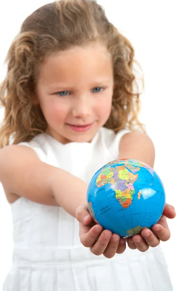 stock image Young girl looking at earth sphere.